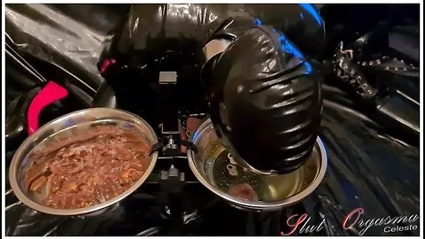 Preview supplied for Slave In Black Latex Eating Dog Food And Drinking Piss